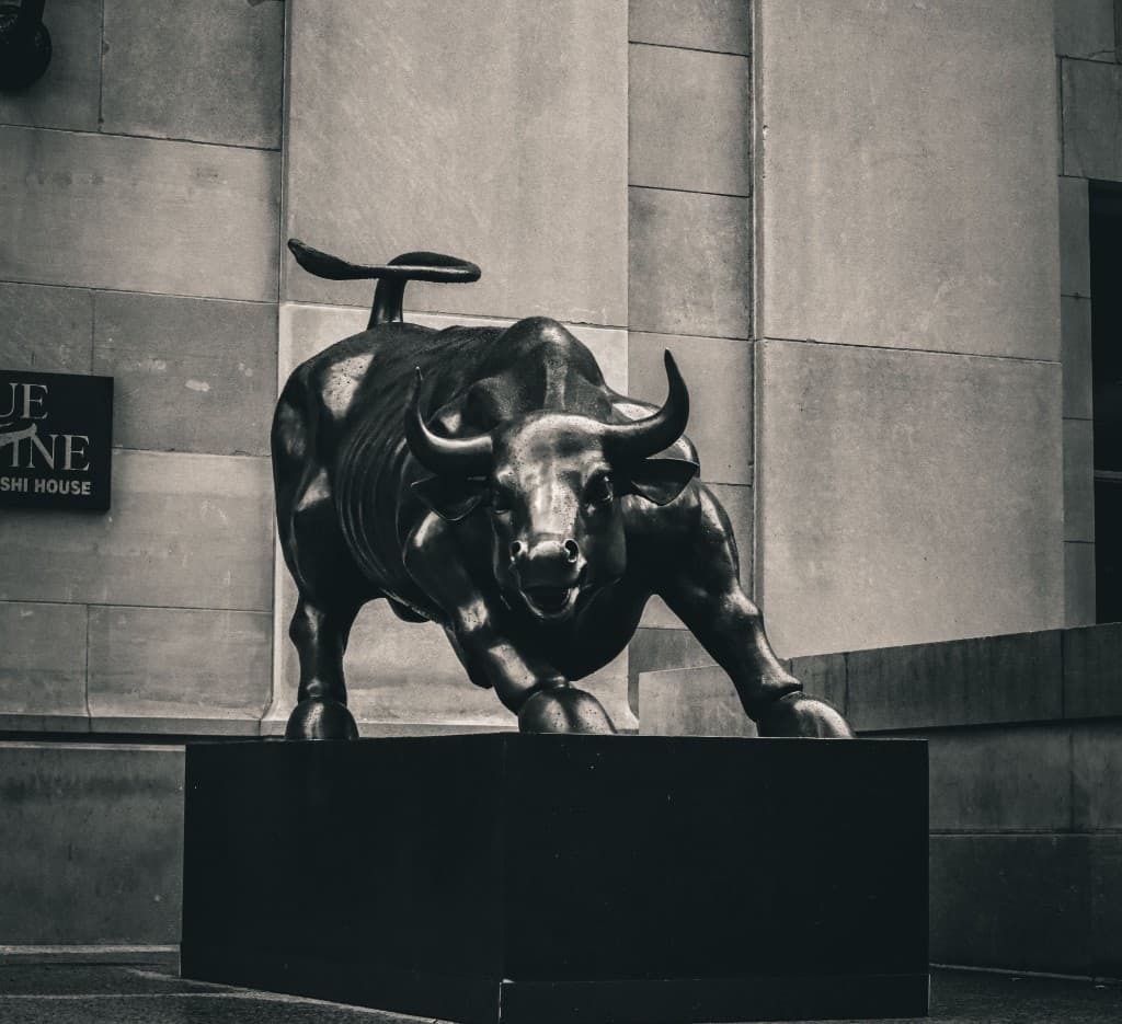 Charging bull statue